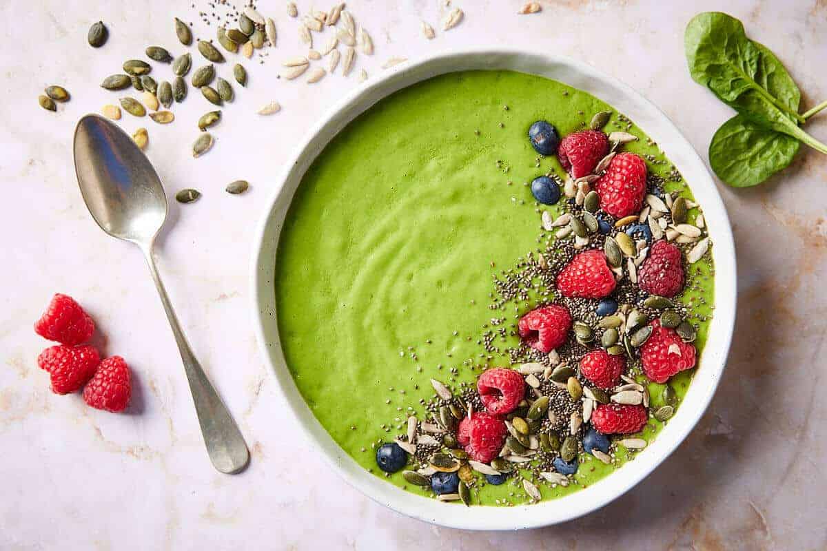 Green smoothie bowl with spinach and avocado